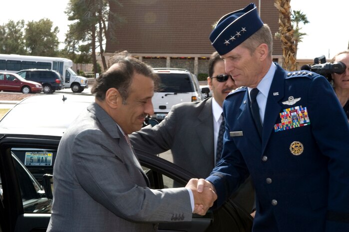 His Royal Highness Prince Khaled bin Sultan, Saudi Arabian Deputy Minister of Defense is greeted by Gen. Mike Hostage, commander of Air Combat Command, during his visit Feb. 23, 2012 at Nellis Air Force Base, Nev. Prince Sultan visited members of the Royal Saudi Air Force who participated in the joint Red Flag and Green Flag exercises. (U.S. Air Force photo by Airman 1st Class Daniel Hughes) 