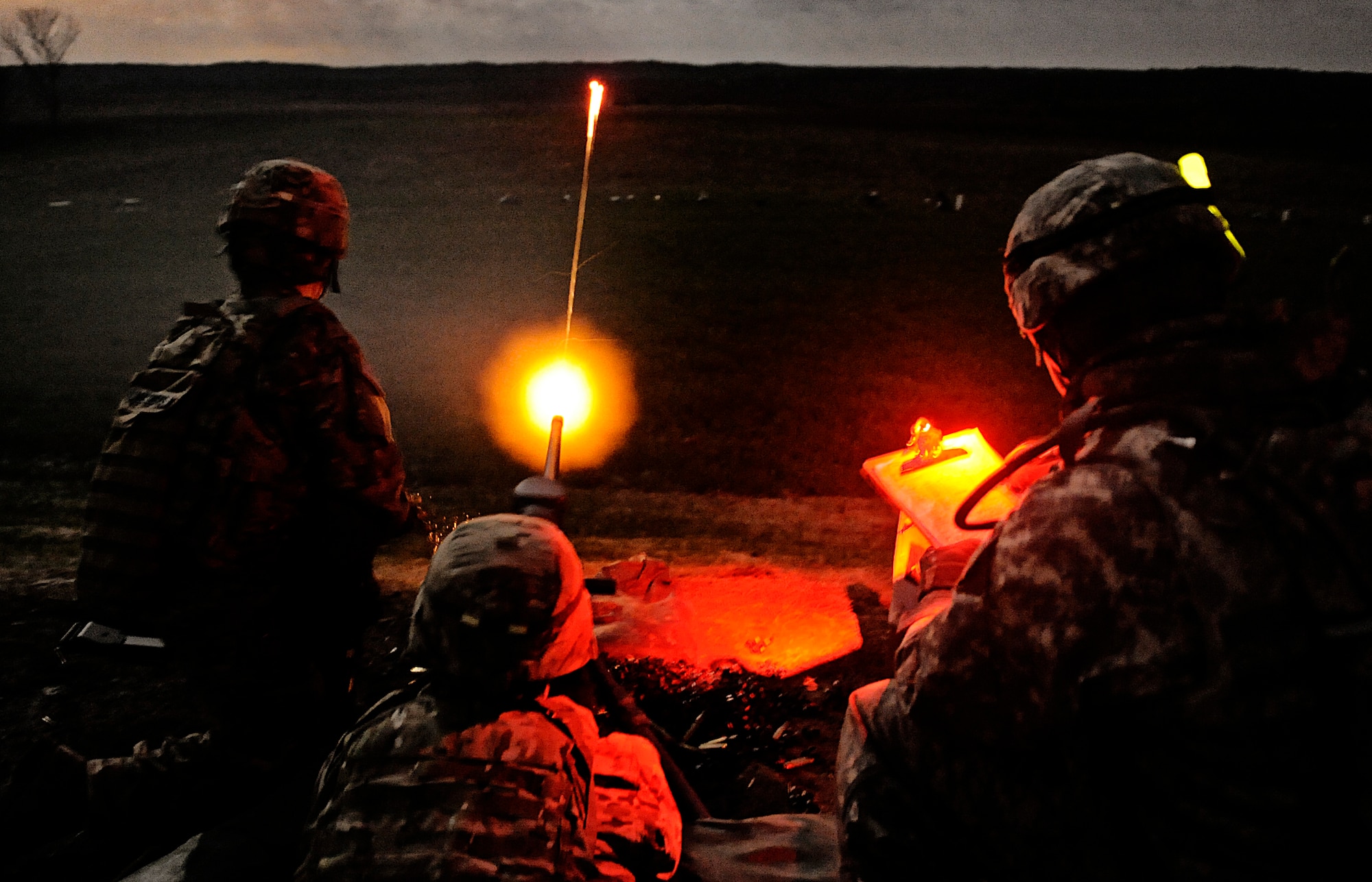 159 Army Staff Sgt. Jason Roberts, squad leader attached to Laghman Provincial Reconstruction Team, fires an M2 .50 caliber machine gun during a night training exercise April 16 at Camp Atterbury, IN. The PRT is attending a three month-long training course to prepare them for their upcoming deployment to Laghman Province, Afghanistan. (U.S. Air Force photo/ Staff Sgt. Ryan Crane)