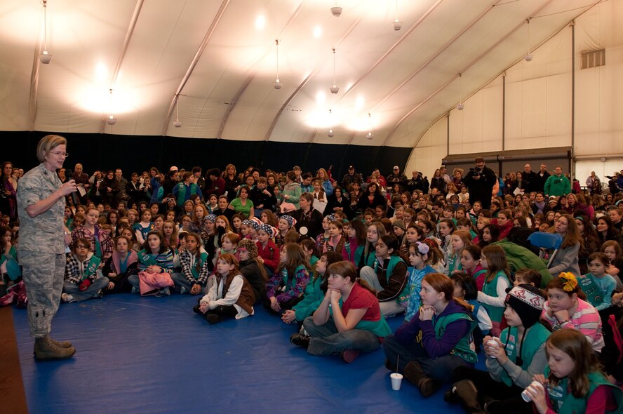 HANSCOM AIR FORCE BASE, Mass. – Col. Stacy L. Yike, 66th Air Base Group commander, addresses more than 1,000 Girl Scouts, troop leaders and volunteers during Operation Cookie Drop in the Tennis Bubble March 3. The scouts dropped off 30,000 boxes of cookies to seven troop-focused non-profit organizations and military and federal government agencies that will deliver them to Airmen, Soldiers, Sailors and Marines around the world. (U.S. Air Force photo by Walter Santos)