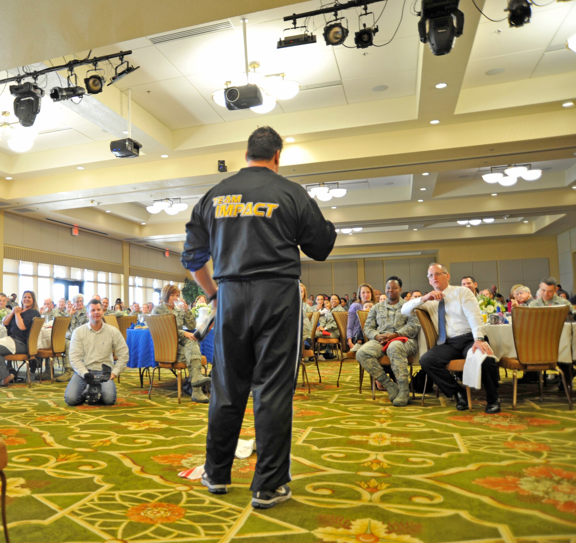 Team Impact leader Jeff Neal speaks to the Keesler community at a breakfast held on National Prayer Day (U.S. Air Force Photo by Capt. J. Justin Pearce).