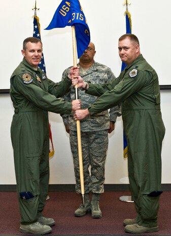 U.S. Air Force Col. Robert Garland, USAF Weapons School commandant, activates the 315th Weapons Squadron while Lt. Col. Jason Seyer, 315th WS commander, assumes command of the 315 WS, March 2, 2012 at Nellis Air Force Base, Nev. The 315 WS's mission is to conduct training for missile combat crews, missile operations staff officers and Department of Defense personnel. (U.S. Air Force photo by Airman 1st Class Matthew Lancaster)