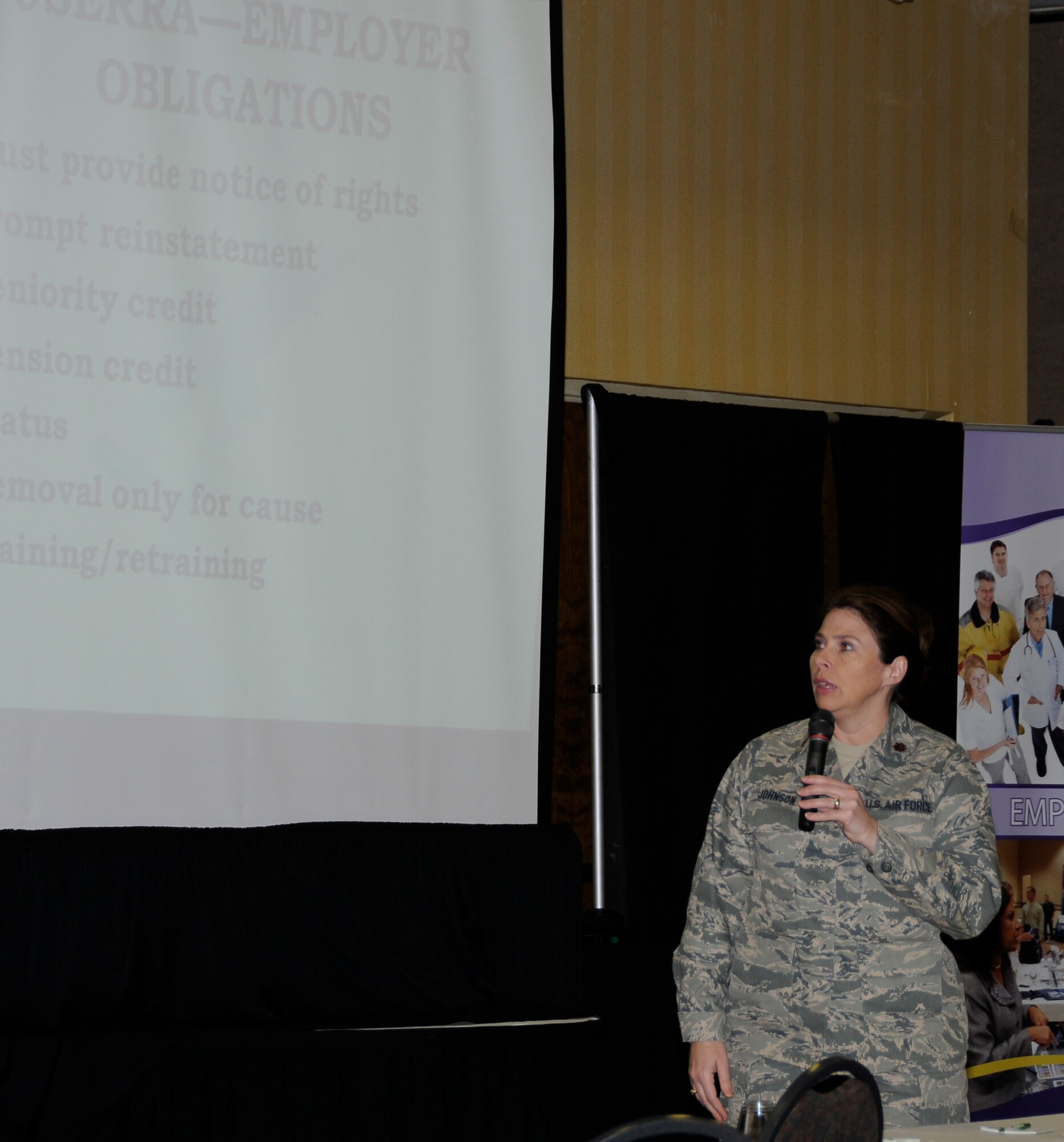 Maj. Jenny Johnson, a judge advocate with the 188th Fighter Wing, briefs service members on the Uniformed Services Employment and Reemployment Rights Act (USERRA) during a Yellow Ribbon Reintegration Program predeployment event March 3, 2012, at the Holiday Inn Convention Center in Fort Smith, Ark. (National Guard photo by Airman 1st Class Hannah Landeros/188th Fighter Wing Public Affairs)