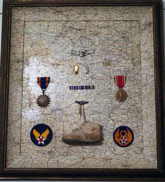 Riza flew a total of 35 combat missions, never leaving the ground without his good luck charm, his son’s leather baby shoe, attached to his parachute harness, on which he wrote the target of every mission he flew. (Courtesy photo)