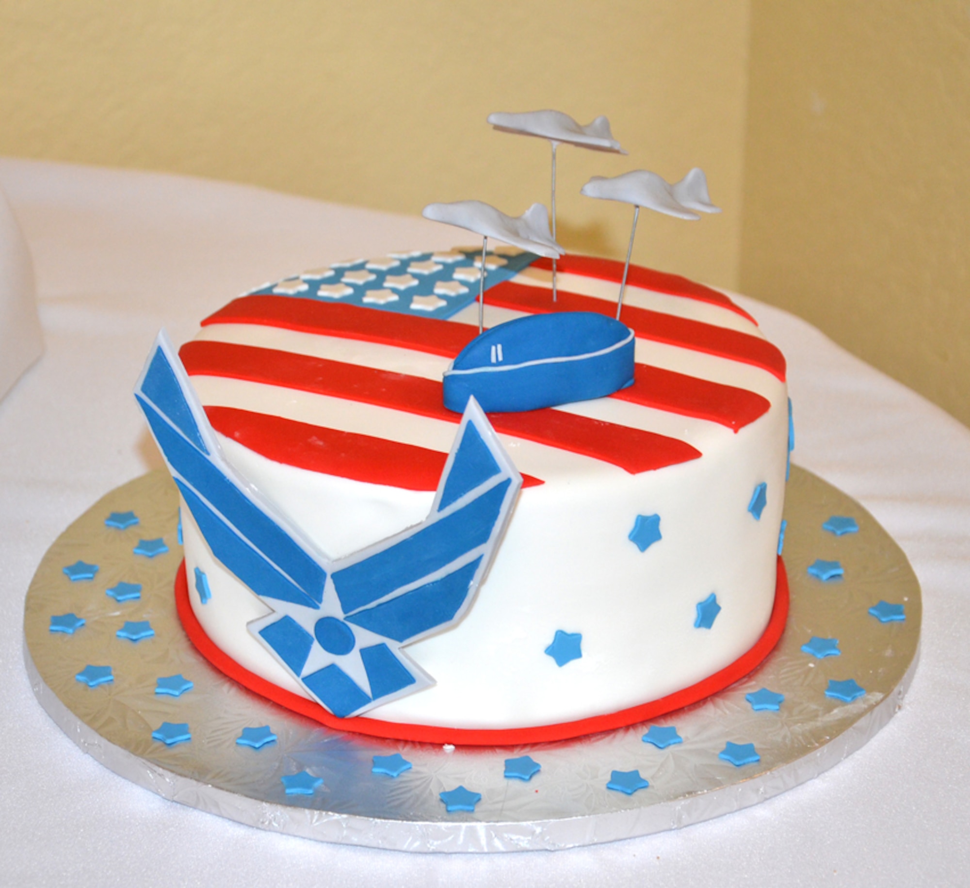 Capt. Paul Hayes, 920th Rescue Wing military equal opportunity officer, received a special groom cake in addition to a free wedding with all the flourishes when he married his fiance Aleshia Panbamrung at a nearby beachfront hotel on Leap Day Feb. 29. The wedding cost the couple nothing because nineteen local vendors sponsored their wedding as part of the launch of new destinations wedding web site launch. (U.S. Air Force photo/Capt. Cathleen Snow)