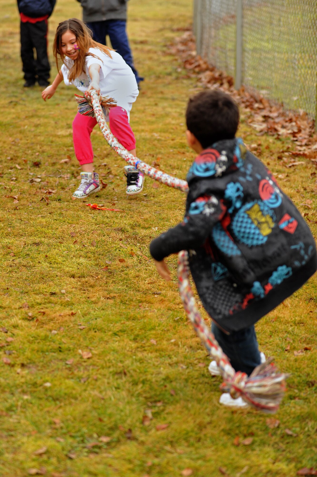 SPANGDAHLEM AIR BASE, Germany – Meisha Camacho, daughter of Tech. Sgt. Jane Camacho, 52nd Dental Squadron, plays tug-of-war with Nathaniel Barr, son of Staff Sgt. William Barr, 52nd Logistics Readiness Squadron, during the FitFactor X-Games event at the Spangdahlem Middle School here March 3. The 52nd Force Support Squadron Youth Programs sponsored the event to introduce and familiarize students and their parents with fitness and health initiatives. FitFactor is an Air Force-wide youth fitness and health program that challenges children age 6 to 18 to be active for an hour each day, eat right and make healthy lifestyle choices. (U.S. Air Force photo by Airman 1st Class Matthew B. Fredericks/Released)