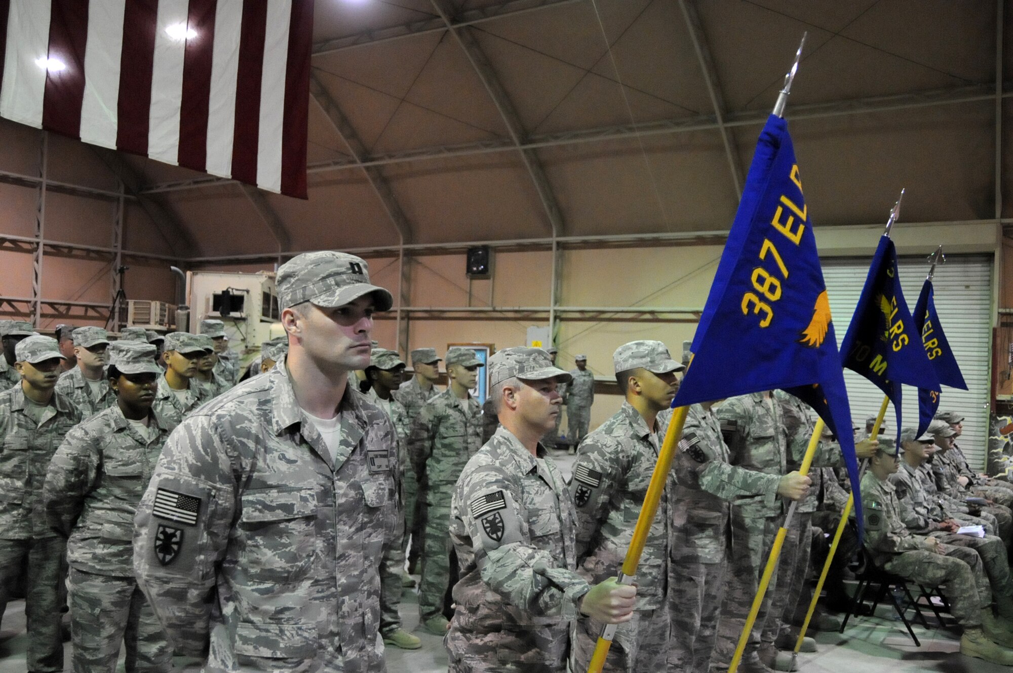U.S. Air Force combat truckers of the 387th Expeditionary Logistics Readiness Squadron stand in formation during the 387th ELRS Inactivation Ceremony at an undisclosed location in Southwest Asia, March 6, 2012. The 387th ELRS participated in the largest retrograde of cargo and personnel since World War II; U.S. Central Command approved the 387th ELRS as "mission complete" and authorized them to inactivate on Dec. 20, 2011. (U.S. Air Force photo by Staff Sgt. James Lieth/Released)
