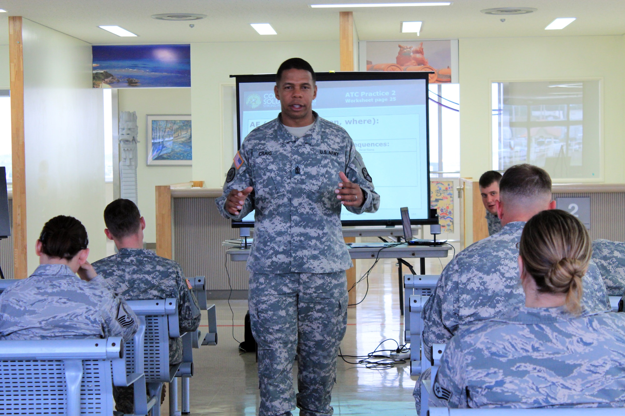 U.S. Army 1st Sgt. Roger Craig, Echo Company, 1st Battalion, 1st Air Defense Artillery, instructs U.S. Air Force and Army members during a week-long joint assistant resiliency trainer course Feb. 21-27, 2012 at Kadena Air Base, Japan. The resiliency course, developed by the Army along with the University of Pennsylvania, provides members with the tools to combat stressful situations before they become bigger problems. (Courtesy photo by Ashleigh Craig/released)