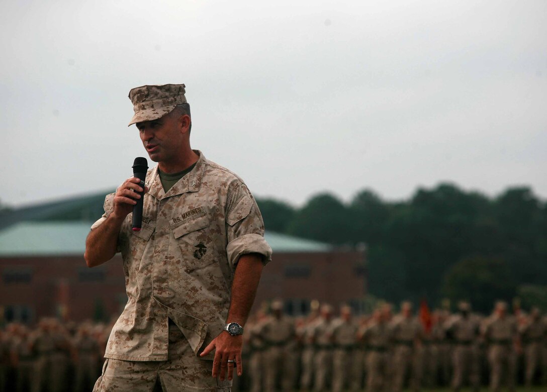 Col. Paul J. Kennedy says farewell and gives thanks to his family, friends and Marines during a change of command ceremony aboard Marine Corps Base Camp Lejeune, N.C., July 14, 2011. Kennedy relinquished his command to Col. William M. Jurney after leading the regiment for the past three years.