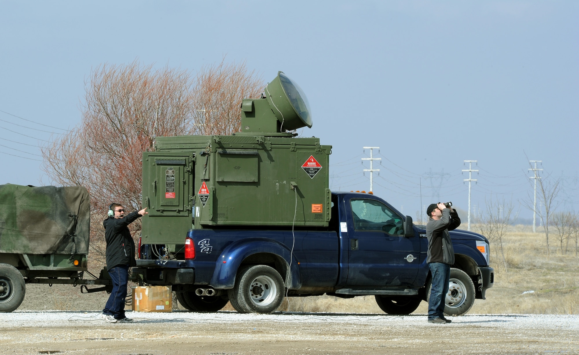 KONY, Turkey – Lance Geyer, Polygone quality assurance inspector, and Carl Gessman, Polygone radar operator, spot aircraft for a tactical radar threat generator during Anatolian Falcon 2012 in Konya, Turkey, March 8. Polygone operated the radar throughout the exercise to provide a simulated enemy ground threat capability to the participating aircraft. (U.S. Air Force photo/Staff Sgt. Benjamin Wilson)
