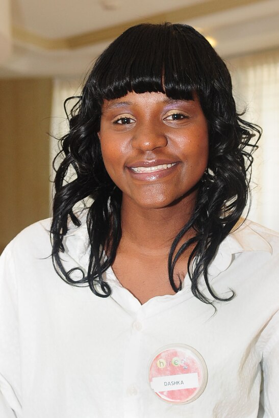 Dashka Ezouard, a 17-year-old high school senior at Woodside High in Newport News, Va., works as a desk clerk at the General Smalls Inn at Fort Eustis, Va., as part of the HIRED Program. HIRED, which stands for being ‘HIRed’, and ‘EDucated’, is a program offered to 15- to 18-year-old teens whose parents or guardians are active-duty military or Department of Defense civilian employees assigned to Fort Eustis. (U.S. Air Force photo by Staff Sgt. Ashley Hawkins/Released)