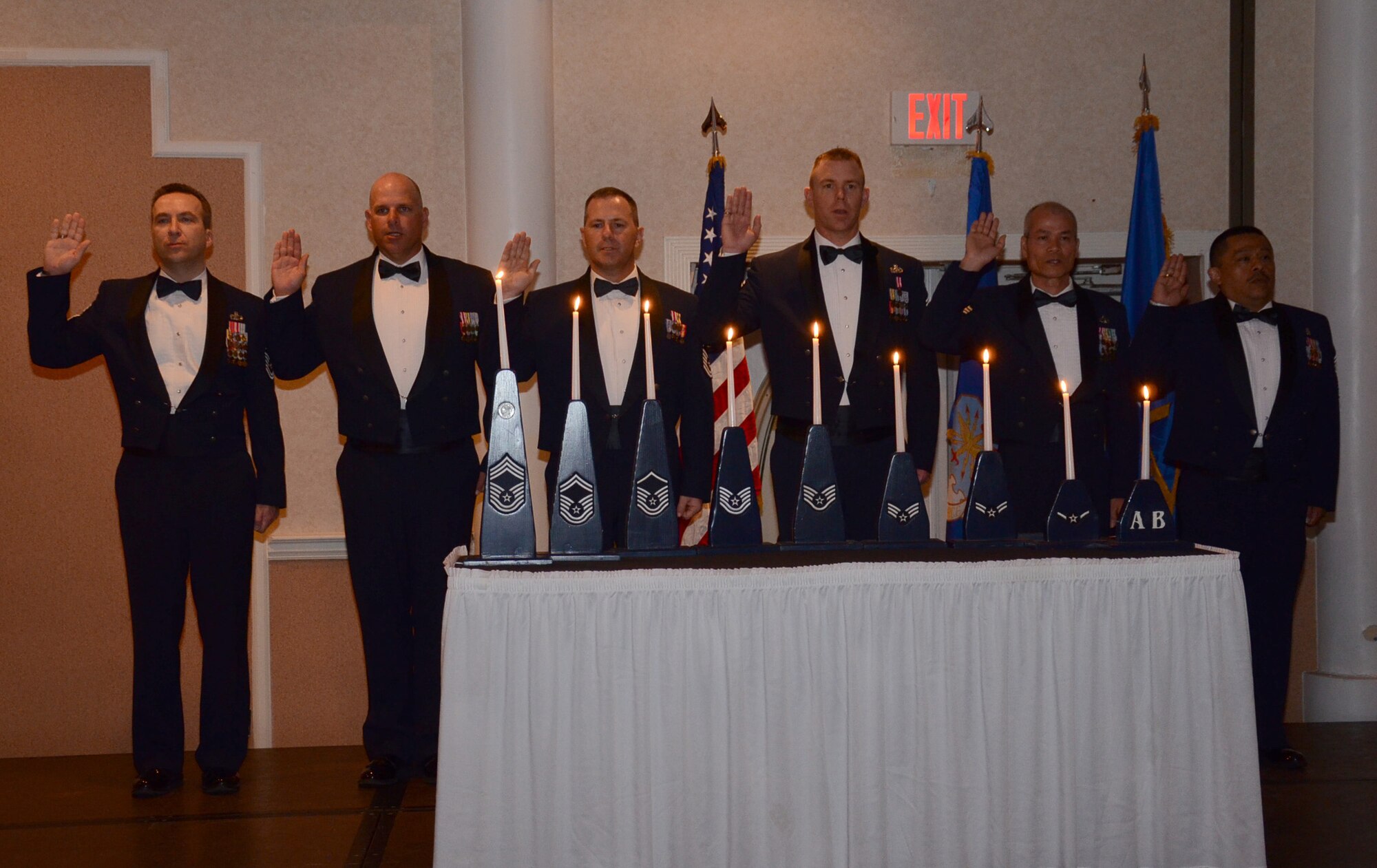 Four newly-pinned chief master sergeants and two chief selects take the Chief's Oath during the Chief's Recognition Ceremony March 3, 2012, in Cocoa Beach, Fla. The chiefs and chief selects were the events honorees and are all assigned to Patrick Air Force Base, Fla. (U.S. Air Force photo/Staff Sgt. Anna-Marie Wyant)