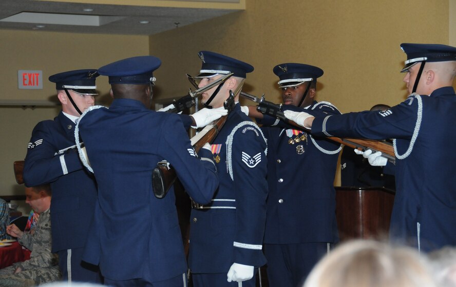 The United States Air Force Drill Team did a four-man drill performance during the National Prayer Breakfast ceremony March 6, 2012, at the Bay Breeze Event Center, Keesler Air Force Base, Miss.  (U.S. Air Force photo by Kemberly Groue)