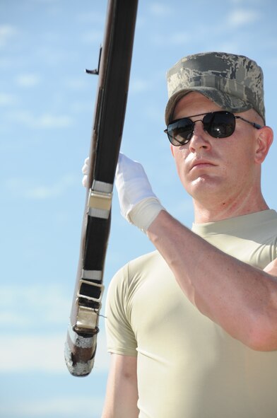 Staff Sgt. Joshua Vanderbeck, U.S. Air Force Honor Guard Drill Team member, practices moves with his rifle on the drill pad behind the Levitow Training Support Facility March 1, 2012, at Keesler Air Force Base, Miss. The drill team began developing their new routine here at Keesler February 27, 2012.  (U.S. Air Force photo by Kemberly Groue)