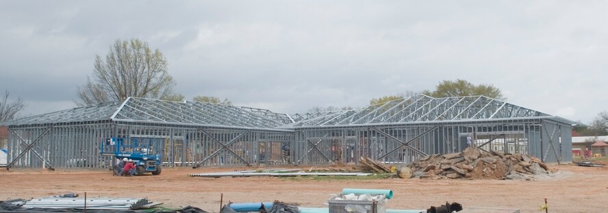 The steel frame of the new addition to the Child Development Center stands on Barksdale Air Force Base, La., March 7. The new facility, measuring over 15,000 sq. ft., is scheduled to be finished in the fall and will allow the CDC to accommodate an additional 142 children at the facility. (U.S. Air Force photo/Senior Airman Kristin High)(RELEASED)