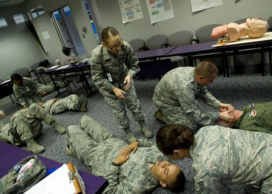 U.S. Air Force Staff Sgt. Claudia Ramirez, 49th Medical Operations Squadron Self Aid and Buddy Care advisor for the 49th Wing, oversees a SABC training class March 7 at the 49th Medical Group Education and Training Flight building. Since becoming the 49th Wing’s SABC advisor in Aug. 2011, the number of the wing’s Airmen trained in SABC has gone from 30 to 80 percent. Because of the importance of SABC, the base has recently revamped its program, and in turn, an increased number of Holloman AFB Airmen have played major roles in accident response. (U.S. Air Force photo by Airman 1st Class Siuta B. Ika/Released)