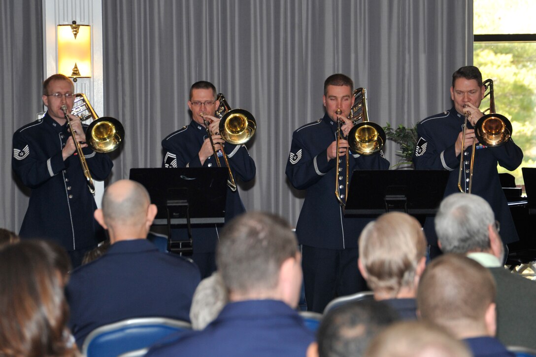 An ensemble of trombones from The USAF Band plays during Col. Lang's assumption of command ceremony at Joint Base Anacostia-Bolling in Washington, D.C., on March 6. (U.S. Air Force photo/Senior Airman Perry Aston)