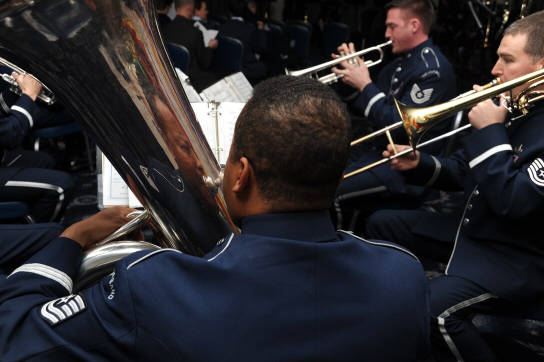 Tech Sgt. Willie Clark, U.S. Air Force Band tuba player, plays before the beginning of the band’s assumption of command ceremony March 6 at Joint Base Anacostia-Bolling in Washington, D.C. The musical talents of the band’s Singing Sergeants, Ceremonial Brass Quintet and Trombone Ensemble resonated during the event as well. (U.S. Air Force photo/ Airman 1st Class Aaron Stout)
