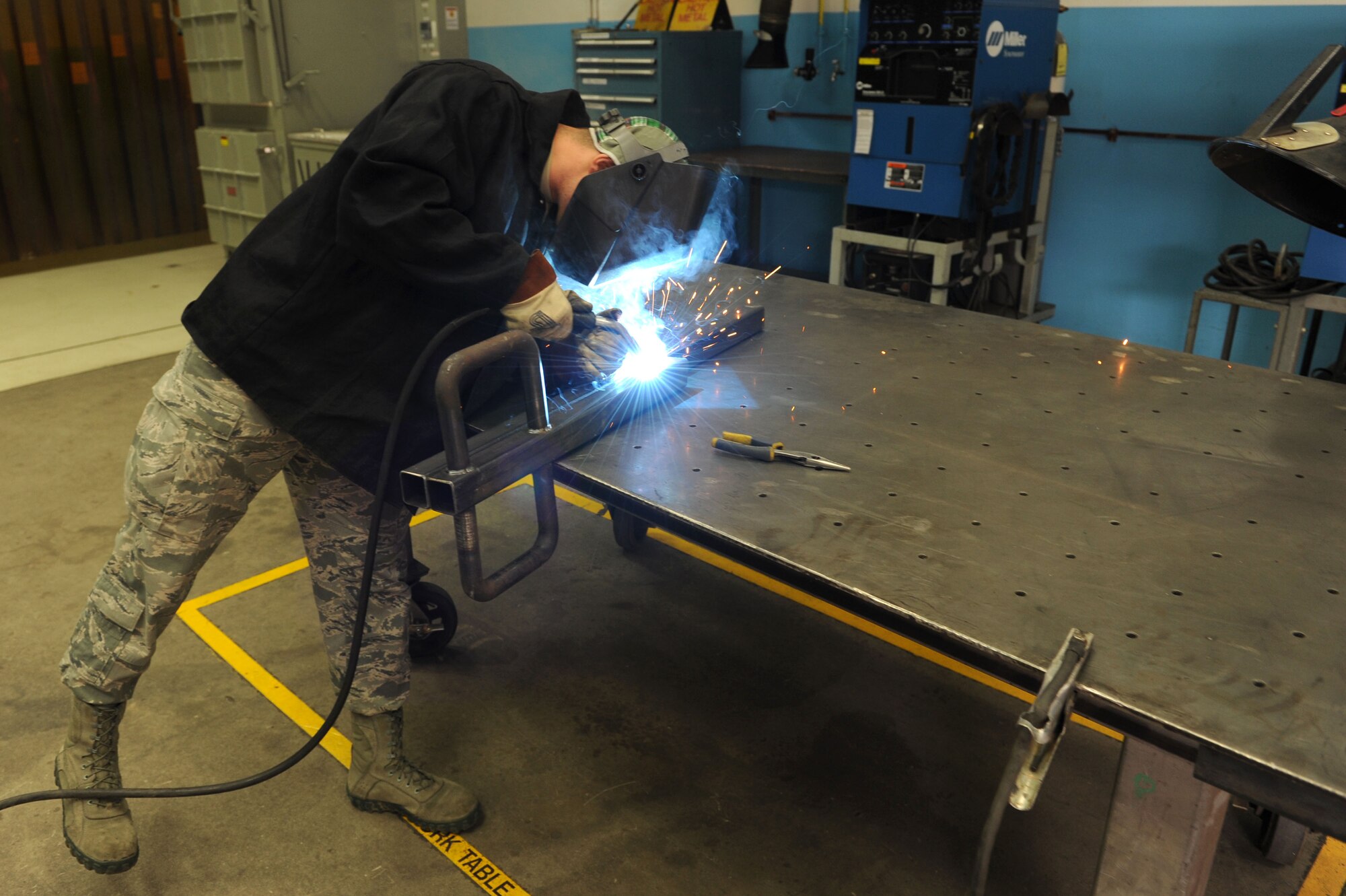 SPANGDAHLEM AIR BASE, Germany – Airman 1st Class Douglas Williams, 52 Equipment Maintenance Squadron aircraft metals technology apprentice, repairs steel tubing using a gas metal arc welder for fabrication use at Bldg. 41 here March 7.  The fabrication flight repair aircraft and support equipment fabricate assets that cannot be bought using computer numerical controlled machines and welding equipment. Fabrication keep 51 F-16 and A-10 aircraft repaired, as well as equipment and facilities worth over $992 million ready to provide combat power to the current flight through precise repairs to all assets. (U.S. Air Force photo by Senior Airman Christopher Toon/Released)