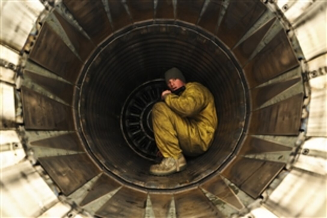 U.S. Air Force Staff Sgt. Mike Radcliff inspects the exhaust of an F-16 Fighting Falcon after a mission during Exercise Anatolian Falcon 2012 on Konya Air Base, Turkey, March 6, 2012. Radcliff is a crew chief assigned to the 52nd Aircraft Maintenance Squadron. The U.S. and Turkish air forces are flying together during the exercise in an effort to strengthen relationships and ensure regional peace and stability.