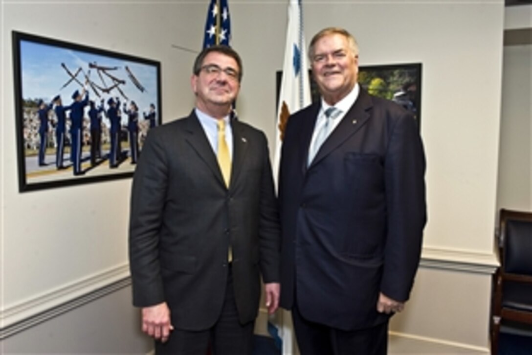 Deputy Defense Secretary Ashton B. Carter meets with Australian Ambassador Kim Beazley at the Pentagon, March 8, 2012.
