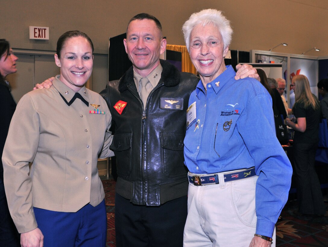 (from left to right) CH-46E pilot Lt. Col. Jenifer Nothelfer with Marine Transport Squadron 1and the commanding general of the 2nd Marine Air Wing, Maj. Gen. Jon Davis pose for a photo with famous female pilot Wally Funk, near the Marines’ recruiting booth at the 23rd Annual Women in Aviation International Conference in Dallas. Aviators and aviation supporters from around the world attended the conference held from March 8 - 10, 2012, to learn from peers and share their experiences in aviation. This year, the conference hosted 3,350 attendees, a new record for WAI.