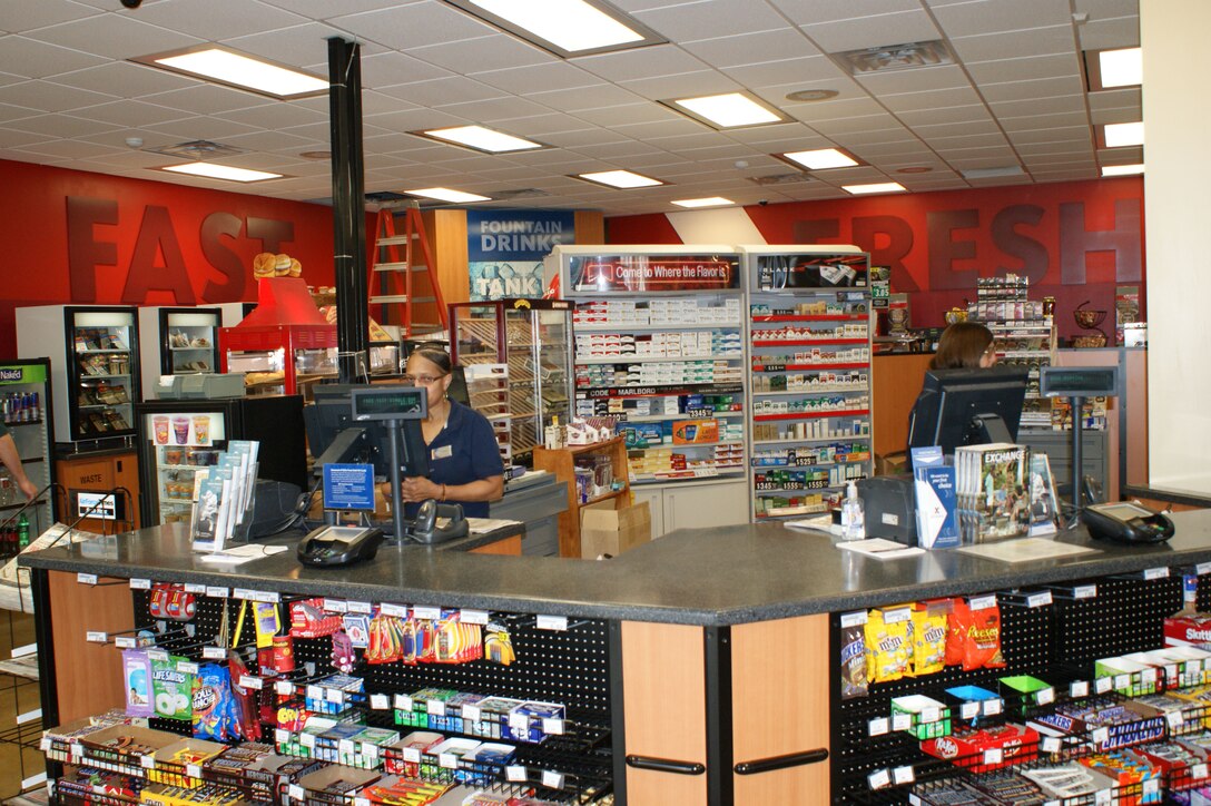 Customers have a brand new checkout counter to use at the AAFES Sheppard South Express Shoppette on Mar. 9, 2012.  The existing shoppette facility was renovated over a six-month time span, with both the exterior and interior receiving makeovers. (U.S. Air Force photo/Dan Hawkins)