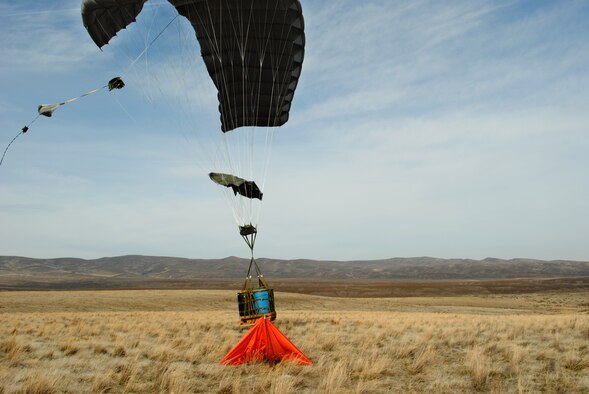 Airmen from the 62nd Airlift Wing successfully completed the first continental C-17 Globemaster III Joint Precision Airdrop System, or JPADS, airdrop during routine training March 8, 2012, by dropping two bundles equaling 2,900 pounds at Yakima Training Center, Wash. (U.S. Air Force photo/Airman 1st Class Leah Young)