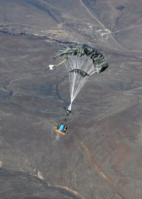 Airmen from the 62nd Airlift Wing successfully completed the first continental C-17 Globemaster III Joint Precision Airdrop System, or JPADS, airdrop during routine training March 8, 2012, by dropping two bundles equaling 2,900 pounds at Yakima Training Center, Wash. The two bundles were dropped at approximately 5,700 feet, which is more than one mile in the air. The first landed within 20 yards of its designated target. The second landed within seven yards. (U.S. Air Force photo/Airman 1st Class Leah Young)
