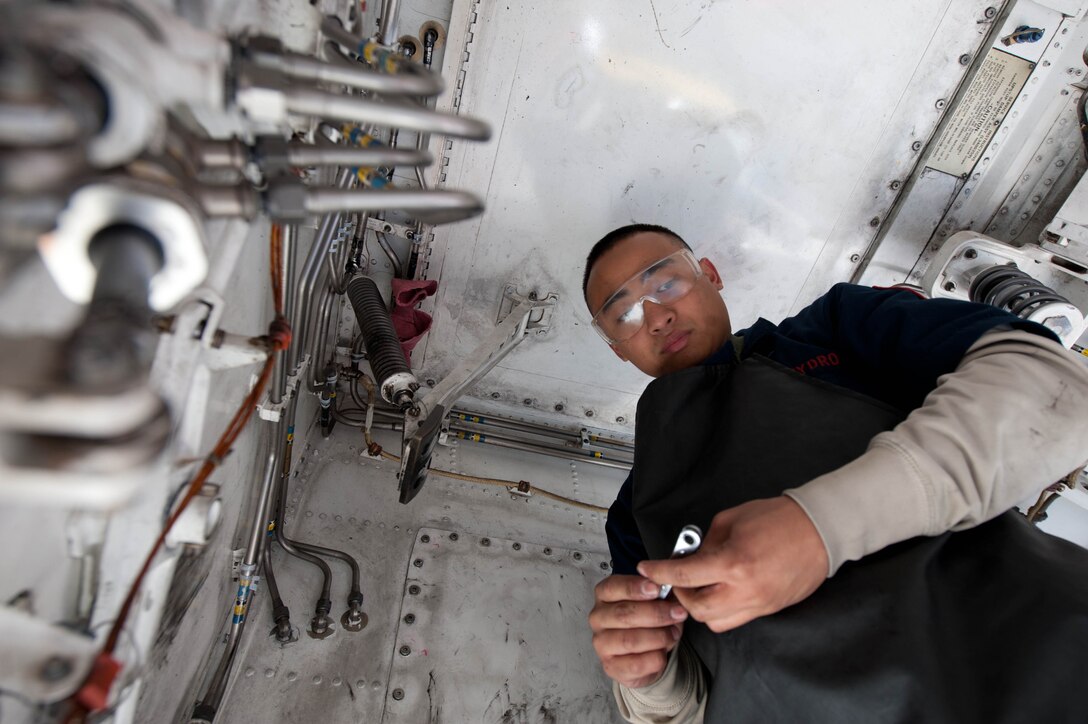 Senior Airman David Ching, 28th Aircraft Maintenance Squadron aircraft systems journeyman, prepares to inspect the fuel system on a B-1B at Ellsworth Air Force Base, S.D., March 8, 2012. The B-1’s fuel systems are routinely checked and maintained to ensure any possible leaks or malfunctions are repaired. (U.S. Air Force photo by Airman 1st Class Zachary Hada/Released)