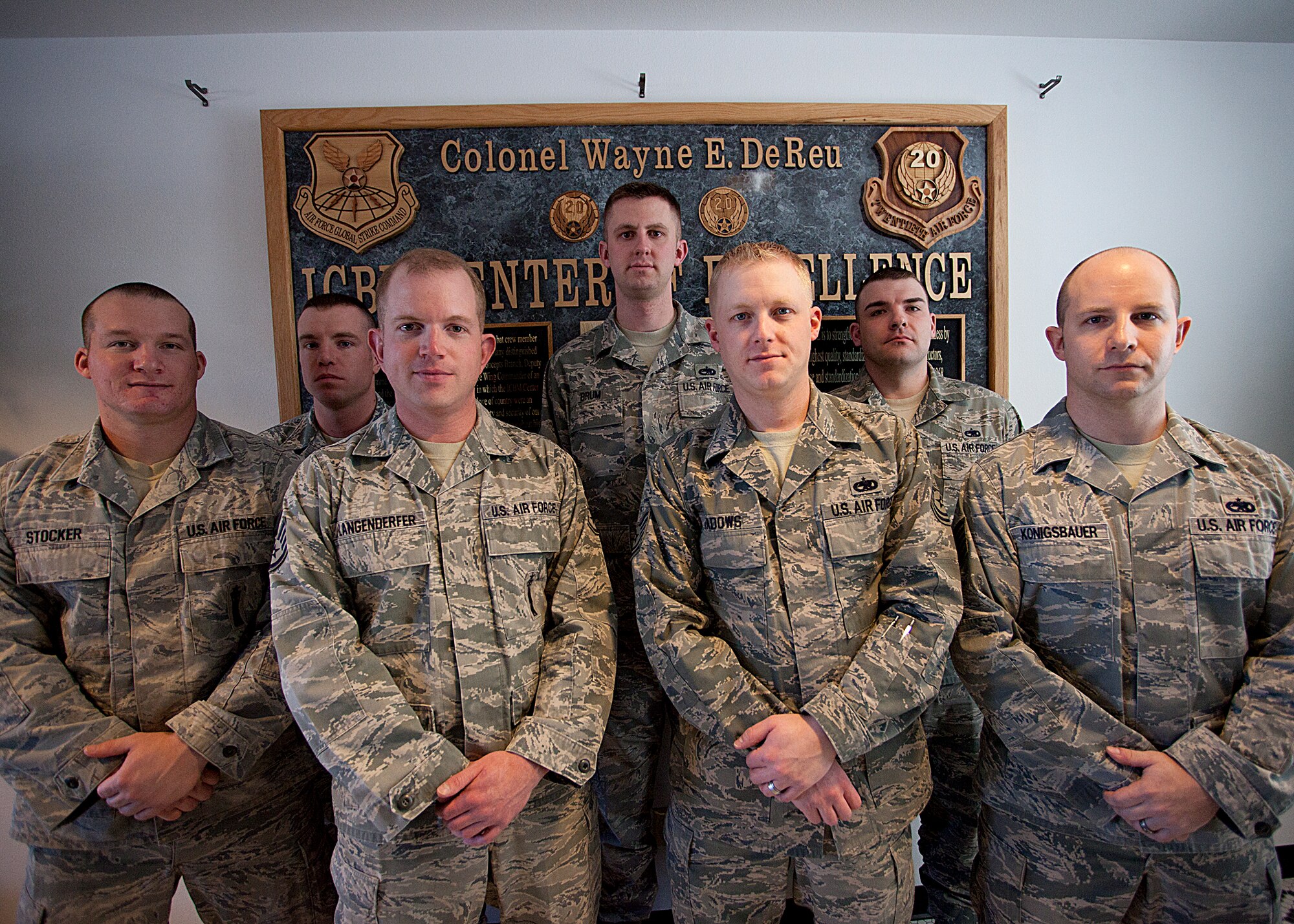 Staff Sgt. Ryan Stocker, Air Force Global Strike Command, 91st Missile Maintenance Squadron; Staff Sgt. Matthew Yager, AFGSC, 341st Munitions Squadron; Staff Sgt. Lucas Langenderfer, AFGSC, 341st Maintenance Operations Squadron; Staff Sgt. Jared Brum, AFGSC, 90th Maintenance Group; Tech. Sgt. Vance Meadows, AFMC, 5th Maintenance Group; Staff Sgt. William Tauffener, AFMC, 709th Munitions Squadron; and Tech. Sgt. Jeffery Konigsbauer, Air Force Materiel Command, 5th Maintenance Group, pose for a photograph upon completion of the Maintenance Evaluators Course March 1. (U.S. Air Force photo by Matt Bilden)
