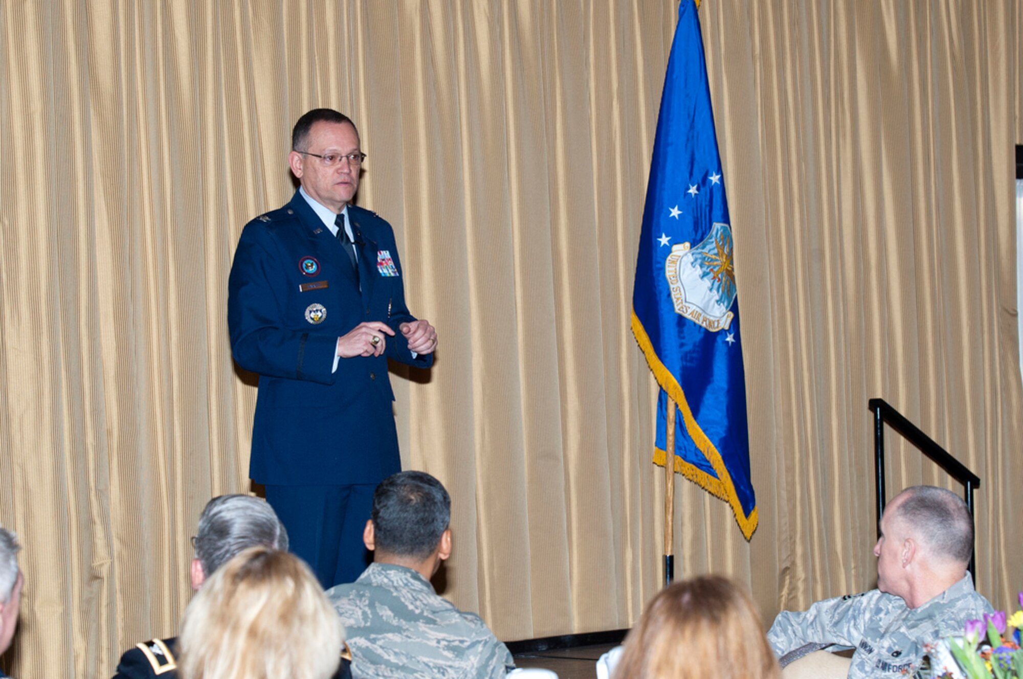 Chaplain (Col.) Conrado Navarro, Command Chaplain for the North American Aerospace Defense Command and U.S. Northern Command, speaks to a full room March 6 at Tommy B's Community Activities Center as the guest speaker for the Joint Base McGuire-Dix-Lakehurst National Prayer Breakfast. The National Prayer Breakfast, formerly known as the Presidential Prayer Breakfast, dates back to 1942. Leaders in the U.S. Senate and House of Representatives met weekly to pray out of concern for the United States’ involvement in World War II. (U.S. Air Force photo by Wayne Russell/Released)