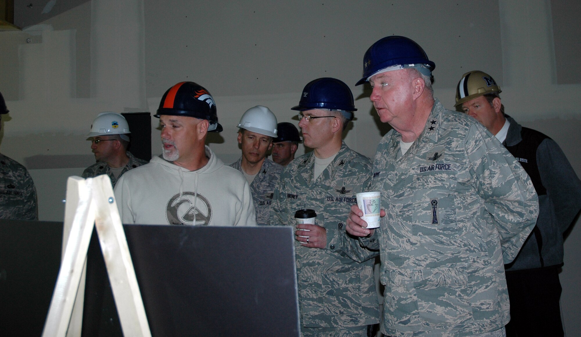 Maj. Gen. Tom Deppe, now retired, gets a tour of the Installation Control Center in the very early stages of its construction during a visit to Malmstrom in May 2009. He envisioned the facility and was a strong supporter of it since he relinquished command of the 341st Missile Wing in 2002. (U.S. Air Force file photo)