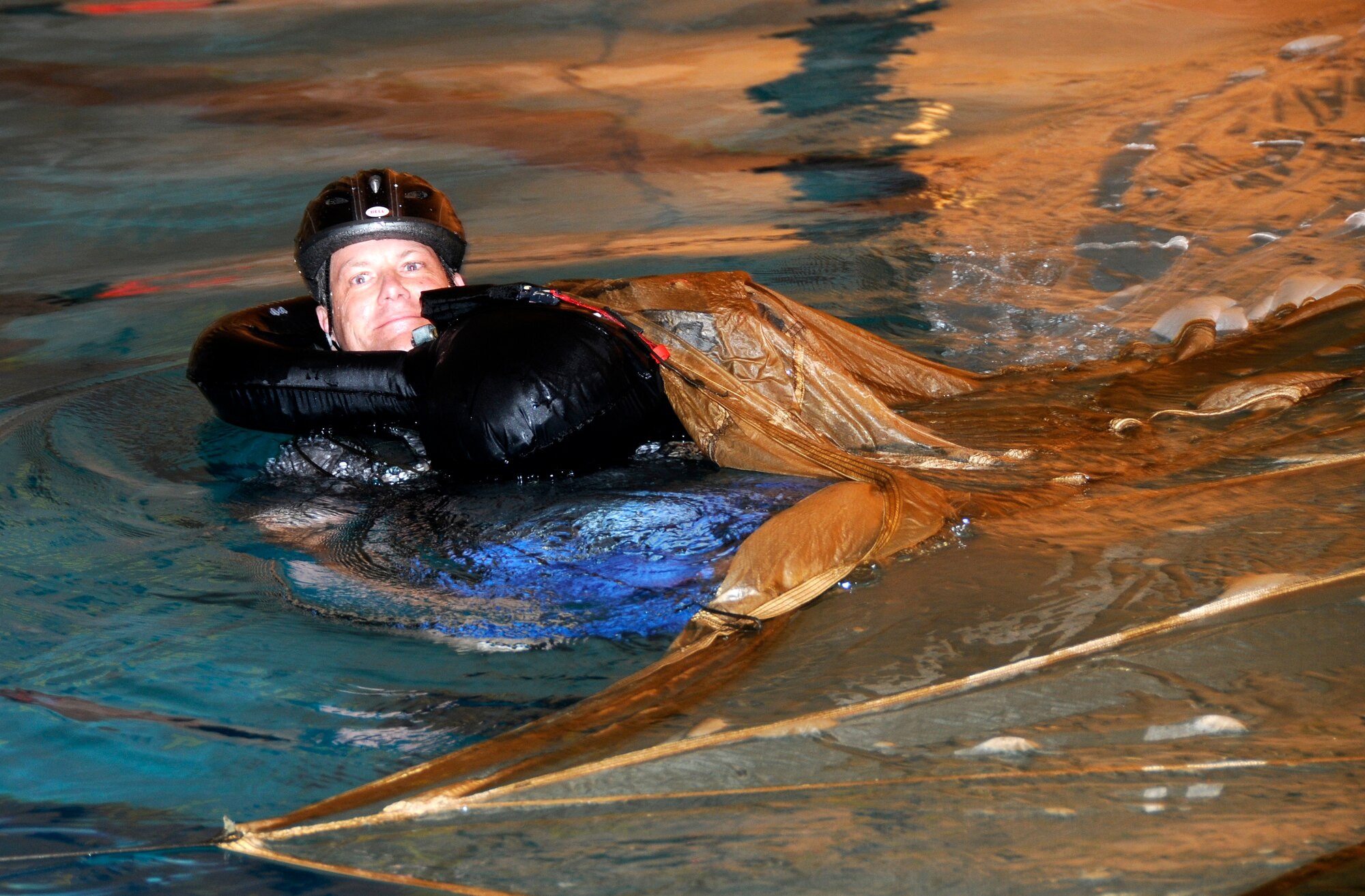 Specialists with the 188th Operations Group’s Life Support Element administered water survival training to pilots with the 184th Fighter Squadron of the 188th Fighter Wing at Creekmore Park in Fort Smith, Ark., March 4, 2012. The training is required for aviators prior to deploying. The objective of the training is to prepare pilots for the potential of ejecting from their A-10C Thunderbolt II “Warthogs” while flying over water. The 188th Fighter Wing will deploy to Afghanistan this summer in support of Operation Enduring Freedom. It will be the unit’s second combat deployment in the A-10. (National Guard photo by Airman 1st Class Hannah Landeros/188th Fighter Wing Public Affairs)