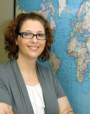 Taking one life-improving step after another, Olivia Collins lost almost half her body weight, earned a college degree and seized an internship opportunity at Tinker, where she now works as a buy manager in the 430th Supply Chain Management Squadron International Business Office. (Air Force photo by Margo Wright)