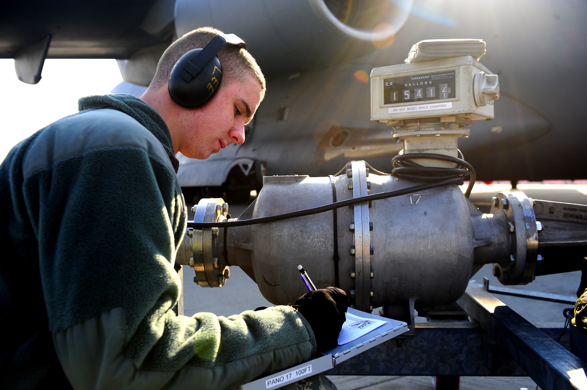 U.S. Air Force Airman 1st Class Ryan Lee, 86th Logistics Readiness Squadron
fuels distribution mobile operator, documents issue quantity after refueling
a C-17 Globemaster III, Ramstein Air Base, Germany, March 6, 2012. Airmen
assigned to the fuels management flight are responsible for refueling all aircraft
at Ramstein, 24-hours a day, seven days a week; issuing more than 130
million gallons of fuel in fiscal year 2011. (U.S. Air Force photo/Airman Brea
Miller)