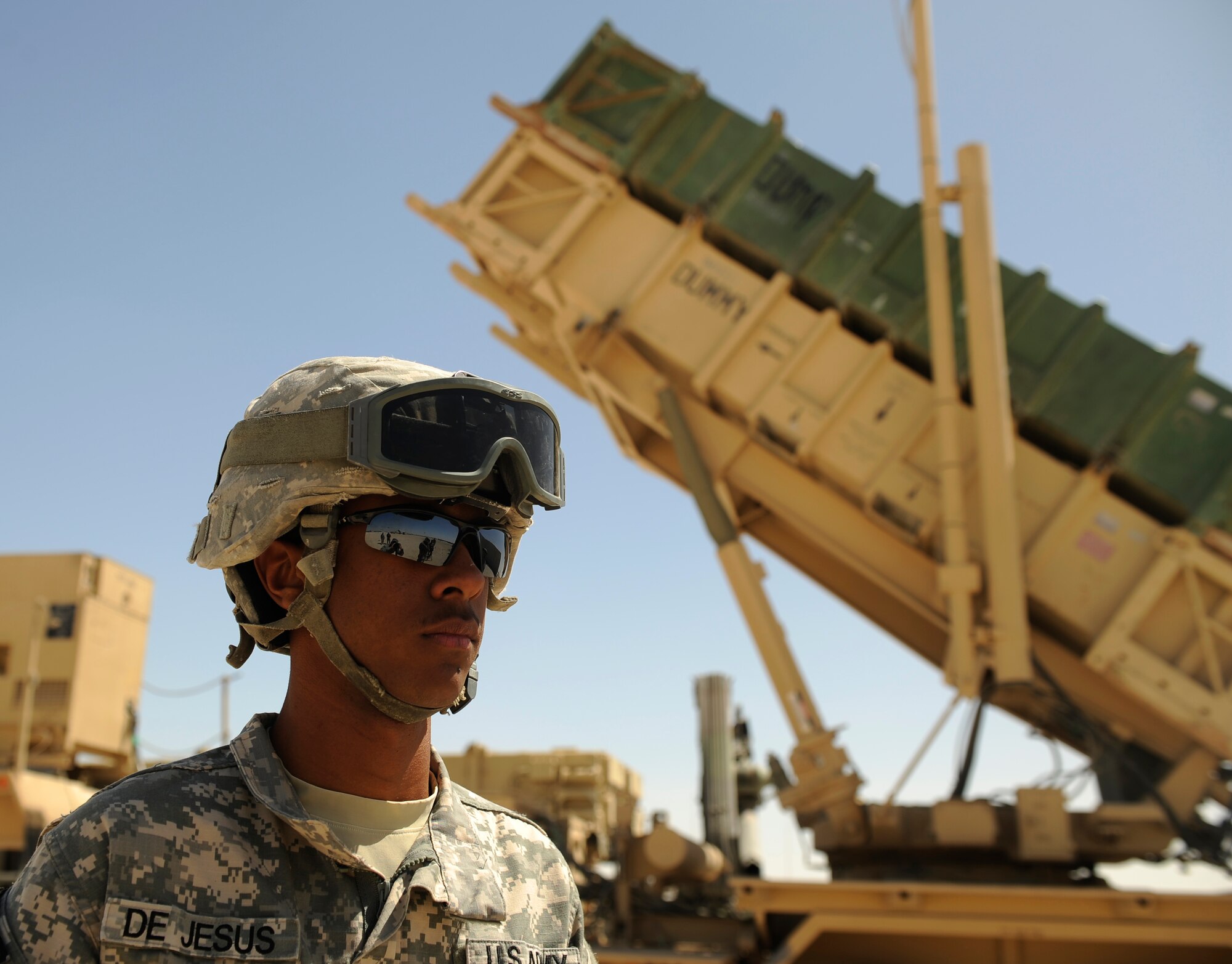 SOUTHWEST ASIA – U.S. Army Spc. Ernesto De Jesus, Bravo 5-52nd Air and Missile Defense Battery launcher station technician and native of Puerto Rico, looks onward after prepping a PAC-2 launcher during a crew drill here March 6, 2012. PAC-2 launchers can be configured to use anti-aircraft weapons and surface-to-air missiles in order to defend against potential aerial threats. (U.S. Air Force photo/Staff Sgt. Nathanael Callon)