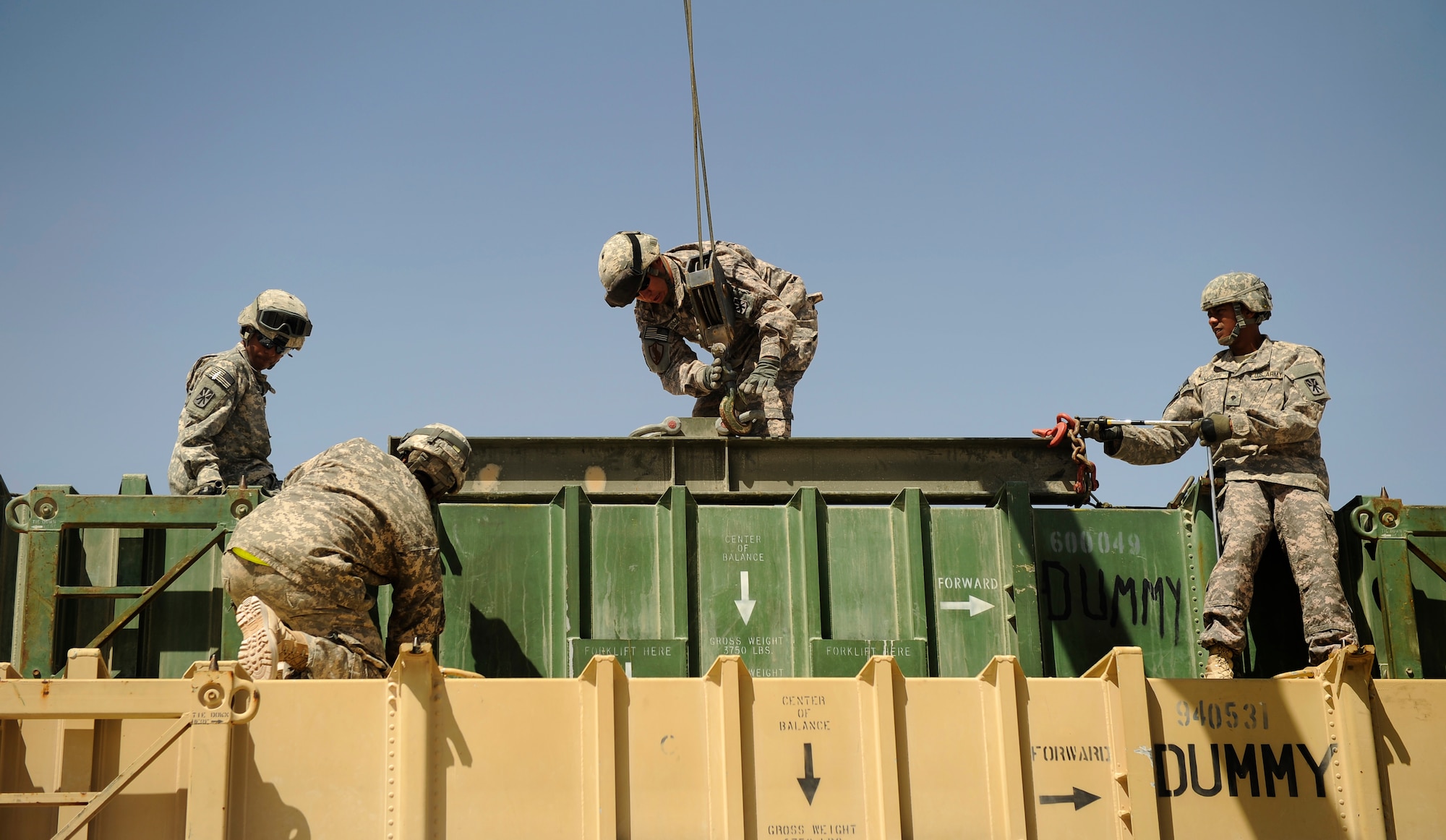 SOUTHWEST ASIA – U.S. Soldiers from the Bravo 5-52nd Air and Missile Defense Battery secure a launcher canister to a PAC-2 launcher during a crew drill here March 6, 2012. The Soldiers take the drills very seriously, so that they are prepared to respond to real-world threats promptly and efficiently. (U.S. Air Force photo/Staff Sgt. Nathanael Callon)
