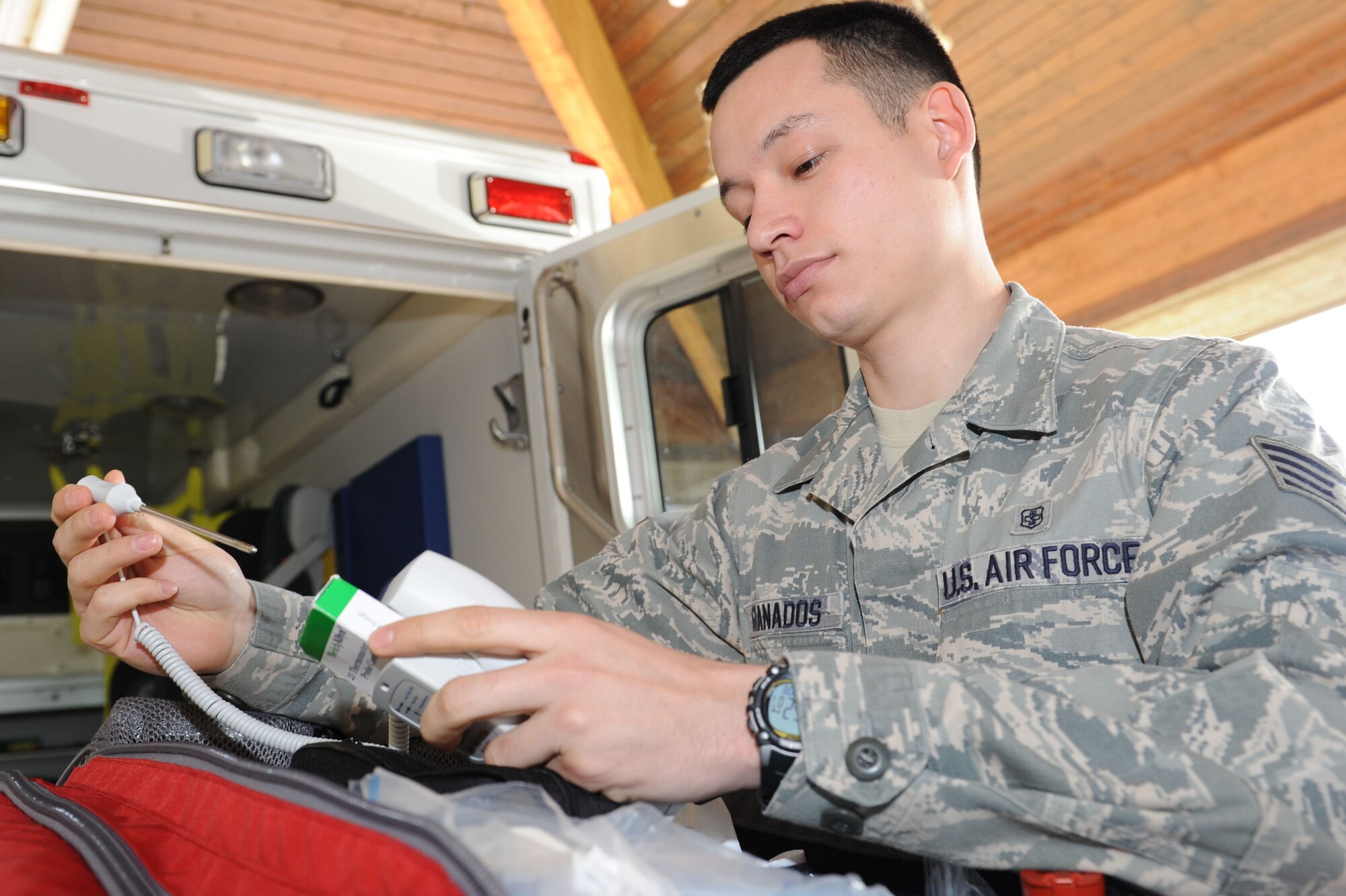 SPANGDAHLEM AIR BASE, Germany – Staff Sgt. Christian Granados, 52nd Medical Operations Squadron ambulance service technician, conducts a function check on a thermometer at Bldg. 137 here March 8. Function checks of all emergency equipment are conducted by technicians at the beginning of every shift. Ambulance techs provide initial medical response on Spangdahlem AB to support base response to in-flight and other mission related emergencies, as well as any other on-base incidents. The ambulance service provides emergency care for more than 8,400 Airmen, department of defense civilians, and their families. (U.S. Air Force photo by Senior Airman Christopher Toon/Released)