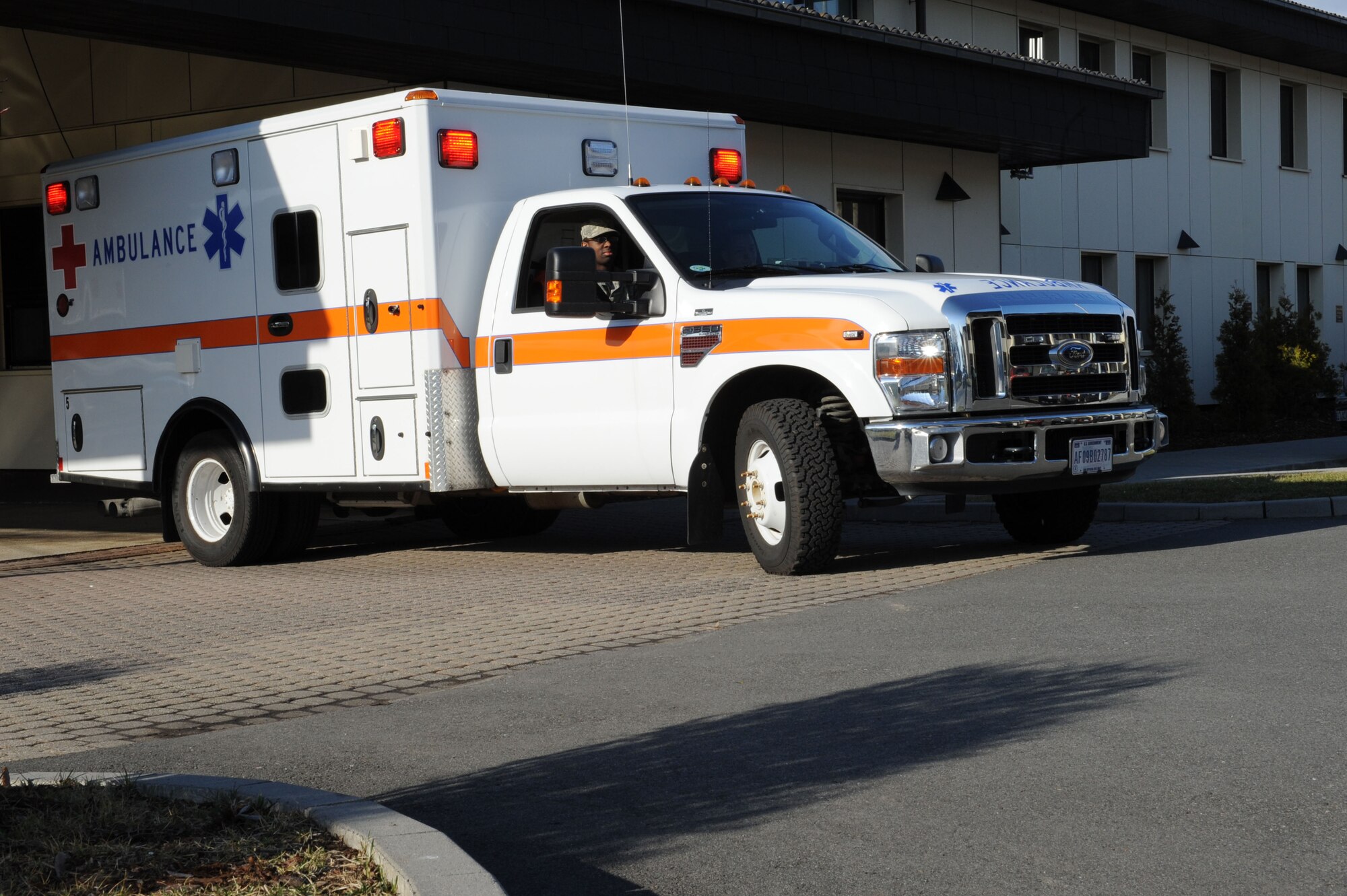 SPANGDAHLEM AIR BASE, Germany – Staff Sgt. Christian Granados and Airman 1st Class Derrick Hogans, 52nd Medical Operations Squadron ambulance service technicians, respond to an incident from Bldg. 137 here March 8. Ambulance techs provide initial medical response on Spangdahlem AB to support base response to in-flight and other mission related emergencies, as well as any other on-base incidents. The ambulance service provides emergency care for more than 8,400 Airmen, department of defense civilians, and their families. (U.S. Air Force photo by Senior Airman Christopher Toon/Released)