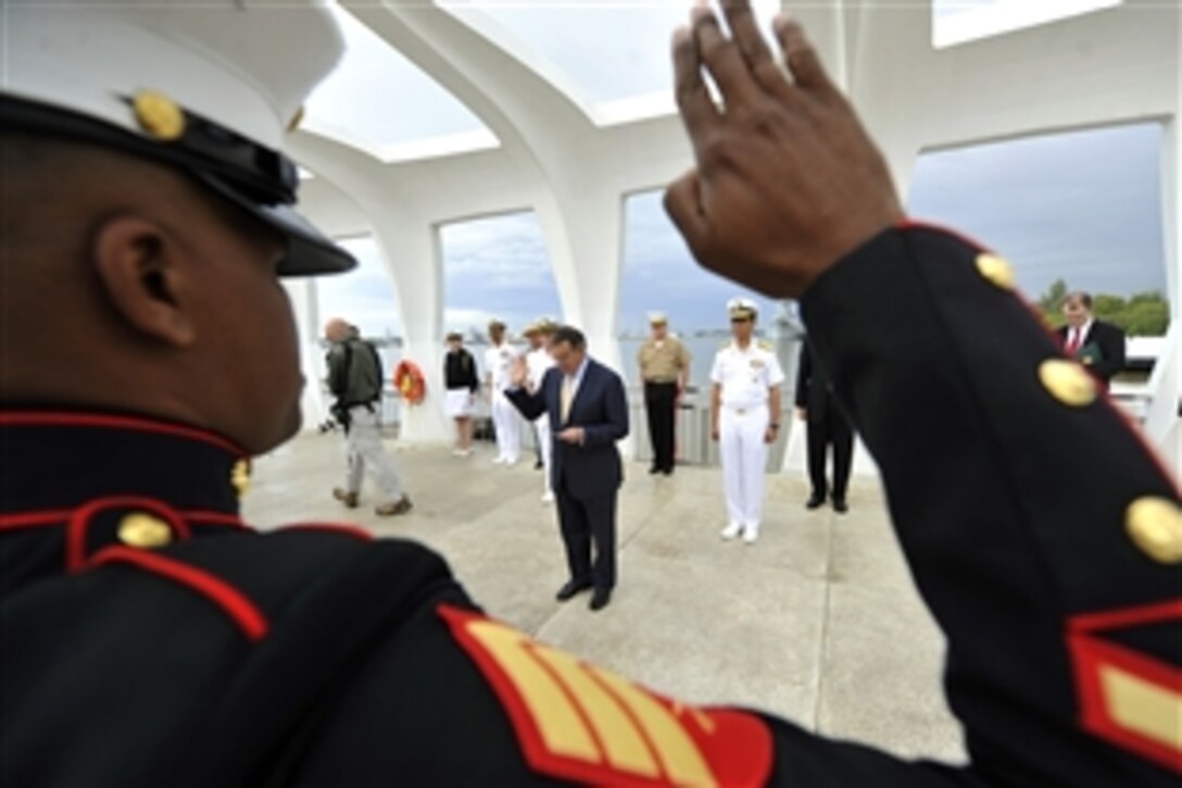 Defense Secretary Leon E. Panetta adminsiters the oath of enlistment to members of each branch of service while visiting the USS Arizona Memorial in Pearl Harbor, Hawaii, March 9, 2012. Panetta was in Hawaii to attend the U.S. Pacific Command change-of-command ceremony.