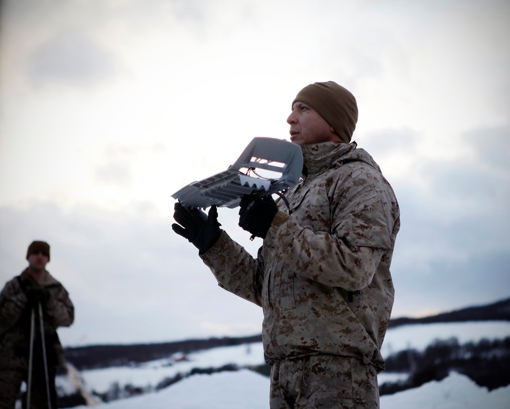 Staff Sgt. Manuel S. Zapien, Marine Corps Mountain Warfare Training Center instructor, and an Amarillo, Texas, native, describes snowshoes during a training session at the Allied Training Center here, March 9. Company K, 3rd Battalion, 24th Marine Regiment, 4th Marine Division, was in Norway March 4-24 for Exercise Cold Response 2012. The multinational invitational event focused on rehearsing conventional-warfare operations in winter conditions and exercising interoperability with the NATO allies. (U.S. Marine Corps photo by Lance Cpl. Marcin Platek)