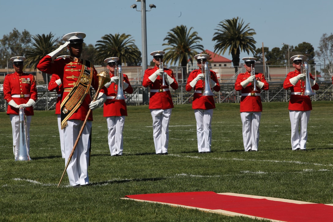 Master Gunnery Sgt. Kevin D. Buckles, senior enlisted advisor of Marine Barracks Washington and the drum major for the U.S. Marine Drum and Bugle Corps, renders a salute to the audience in between performances during the annual Battle Colors ceremony at Camp Pendleton's 11 Area Parade Deck, March 9.