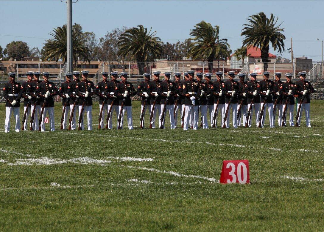 The Silent Drill Platoon stands at ease after an outstanding performance during the Battle Colors Ceremony at Camp Pendleton’s 11 Area Parade Deck, March 9.