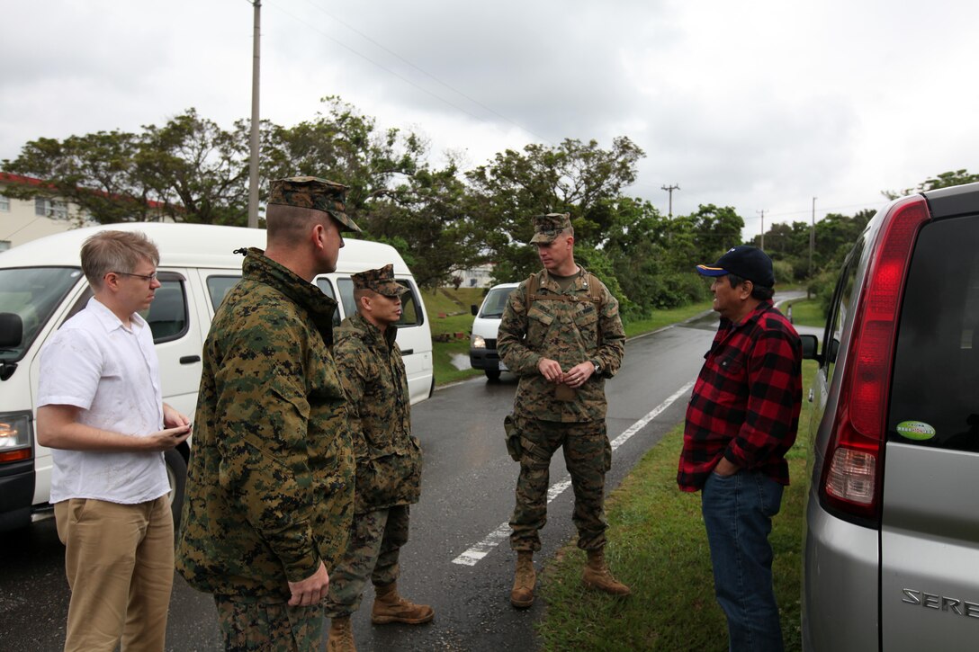 Lt. Col. Troy Roesti (left), executive officer of the 31st Marine Expeditionary Unit, and Lt. Col. William Arick (right), commanding officer of Combat Logistics Battalion 31, 31st MEU,  speak with a local town mayor to understand the needs of people during a humanitarian aid and disaster relief exercise here, Mar. 10.  Gunnery Sgt. Cyrus Nator, the assistant operations chief of the 31st MEU, translates in Tagalog to the mayor.  The 31st MEU is currently conducting their certification exercise, which is conducted with the Amphibious Squadron 11, and qualifies the MEU/ARG team for a wide range of actual contingency missions in the Asia-Pacific region.  The 31st MEU is the United States’ expeditionary force in readiness in the Asia-Pacific region, and is currently deployed with Amphibious Squadron 11.
