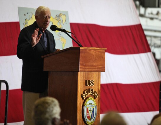 Former President Jimmy Carter speaks to members of the Carter Center and servicemembers during a visit to the USS Peleliu, Mar. 10. The visitors flew from all parts of the U.S. for the Carter Center Winter Weekend and were able to see firsthand the USS Peleliu and learn about the capabilities of the 15th Marine Expeditionary Unit.