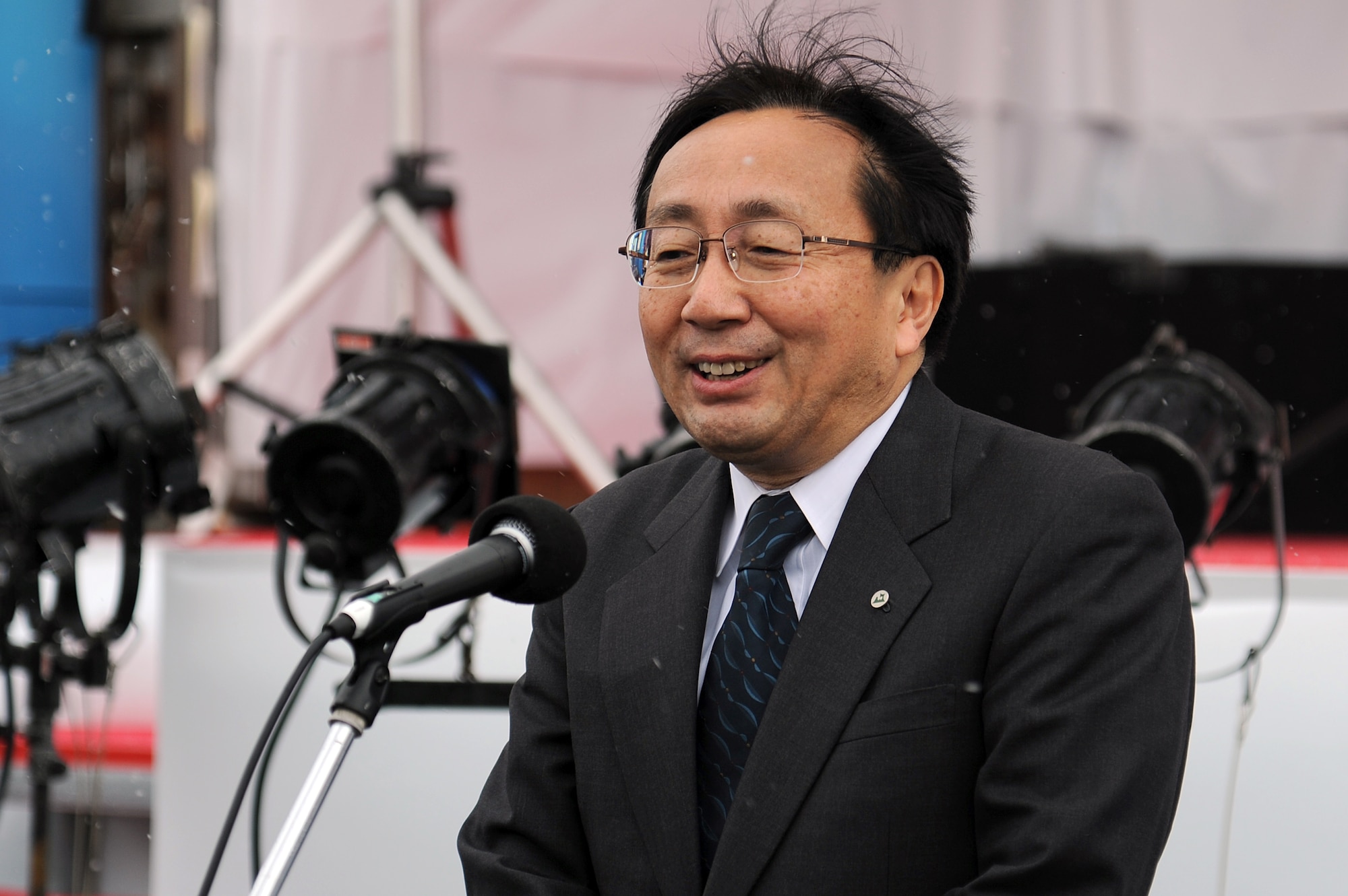 Governor Shingo Mimura, Aomori Prefecture, gives opening remarks during a remembrance ceremony held at Momoishi Port in Oirase Town, Japan, March 11, 2011. Oirase Town hosted a two-day event to remember the victims of the 9.0 magnitude earthquake and subsequent tsunami that occurred on March 11, 2011. (U.S. Air Force photo by Tech. Sgt. Marie Brown/Released)
