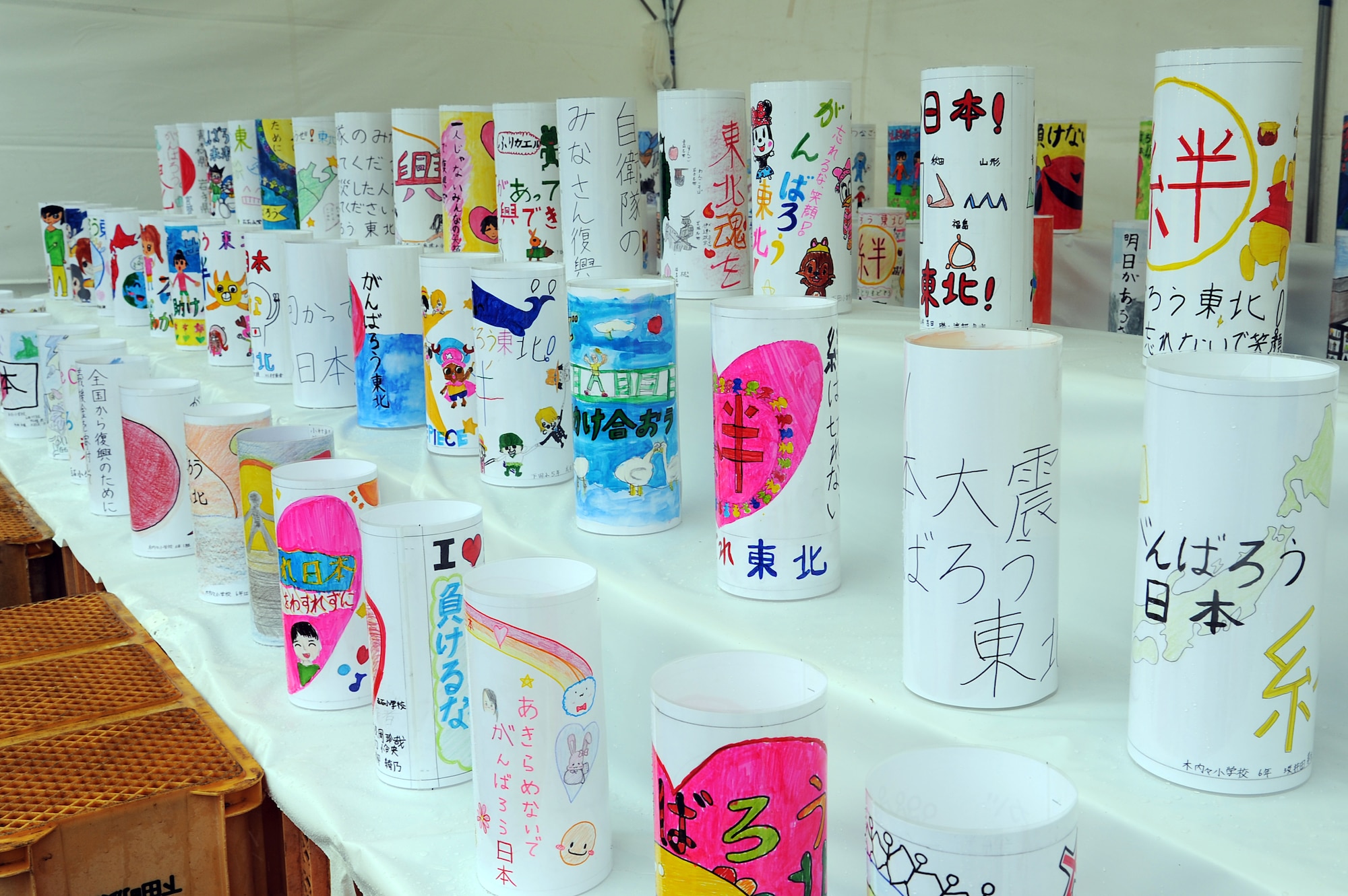 Hand-made lanterns sit on display during a remembrance ceremony at Oirase Town, Japan, March 11, 2012. Lanterns were lit during a memorial lights display to pay tribute to those who lost their lives during the 9.0 magnitude earthquake and subsequent tsunami on March 11, 2011. (U.S. Air Force photo by Tech. Sgt. Marie Brown/Released)
