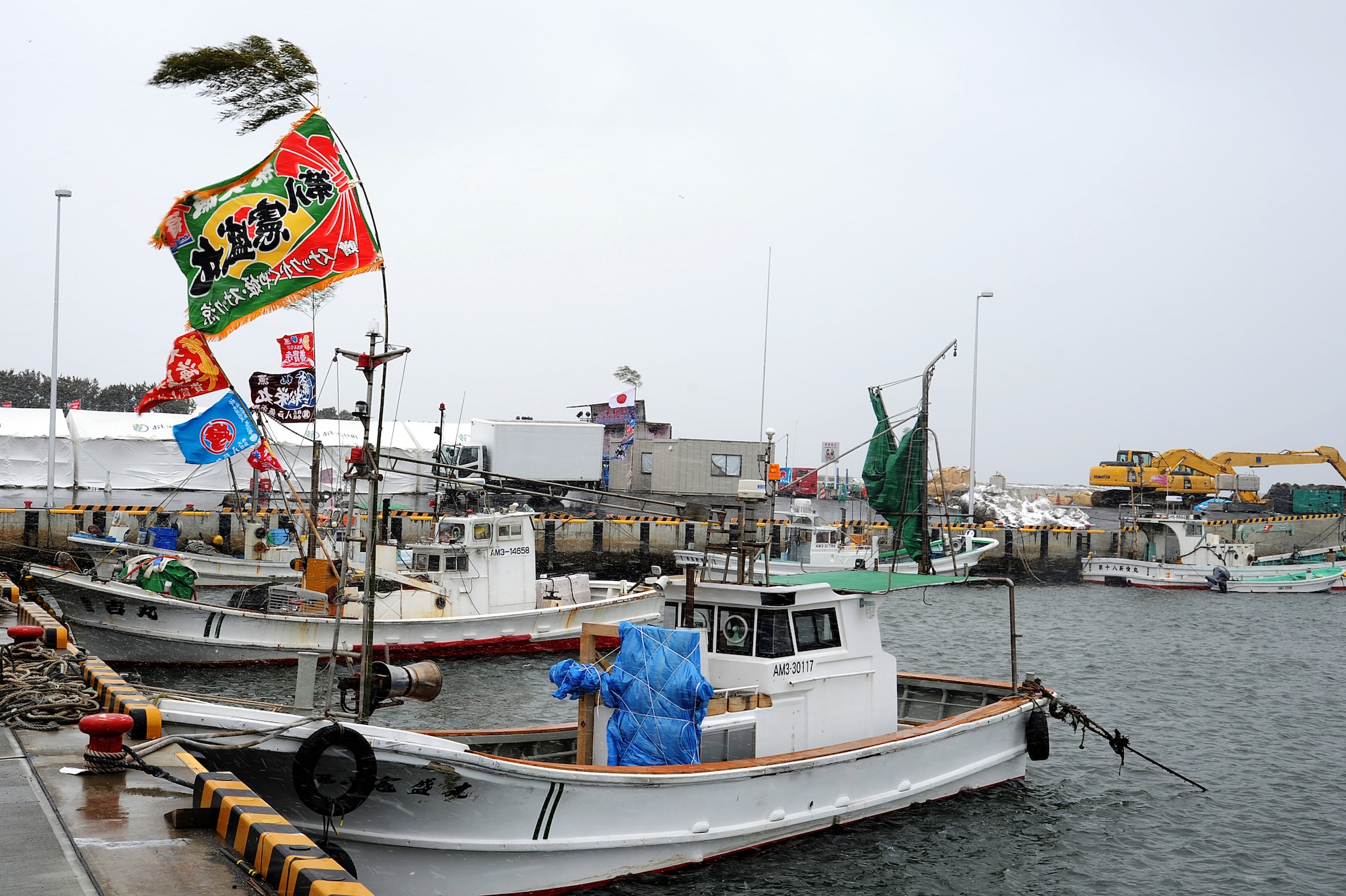 Fishing boats sit in the water at Momoishi Port in Oirase Town, Japan, March 11, 2012. Oirase Town hosted a two-day event to remember the victims of the 9.0 magnitude earthquake and subsequent tsunami that occurred on March 11, 2011. (U.S. Air Force photo by Tech. Sgt. Marie Brown/Released)
