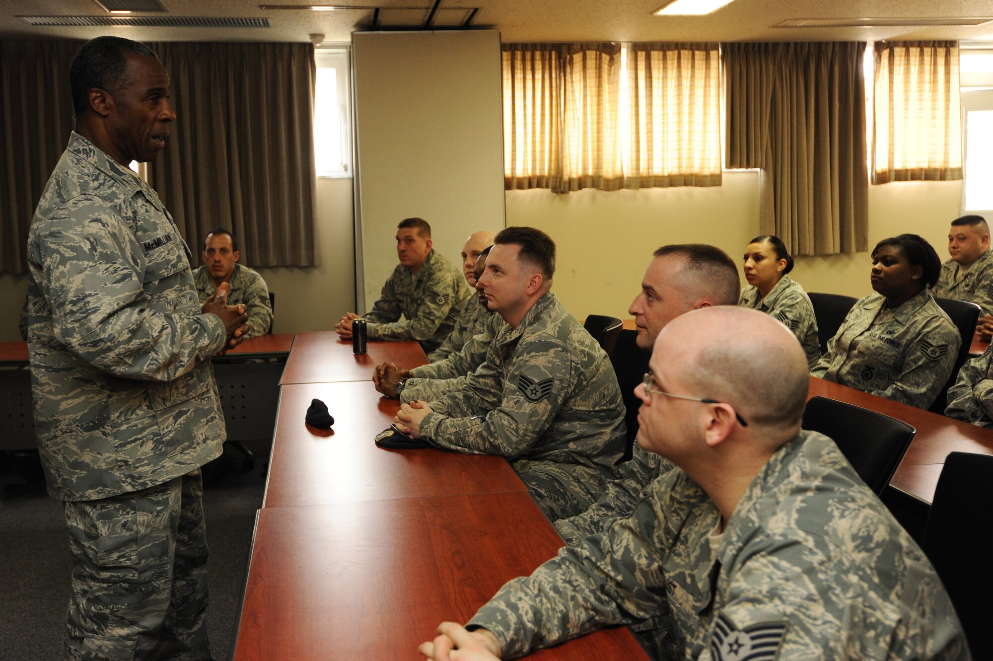 U.S. Air Force Brig. Gen. Jimmy McMillian, Air Force director of Security Forces, talks to members of the 35th Security Forces Squadron, at Misawa Air Base, Japan, March 9, 2012. McMillian discussed topics such as resiliency, technology and the improvement of law enforcement equipment with 35 SFS Airmen. (U.S. Air Force photo by Airman 1st Class Kia Atkins/Released)