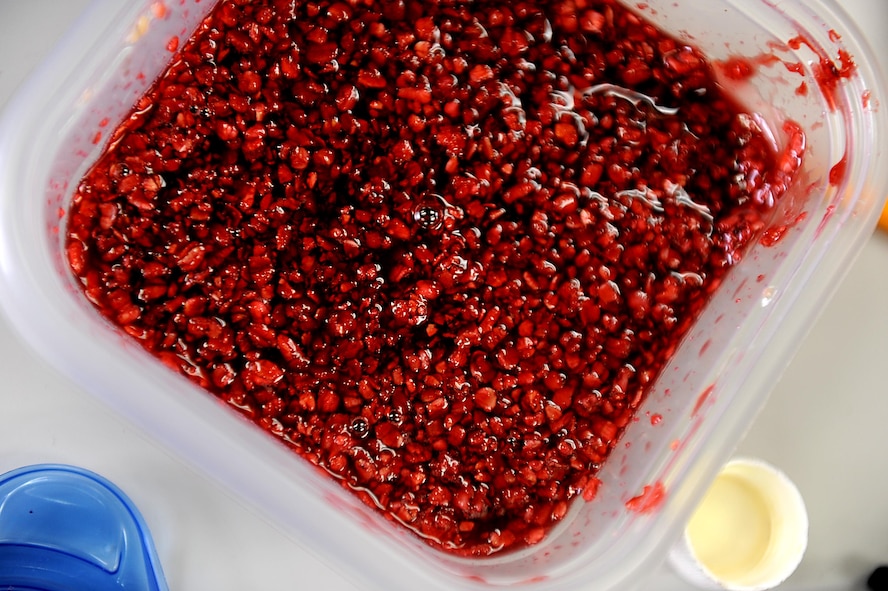 Oatmeal and food coloring are mixed together to simulate blood for fake wounds on Kadena Air Base, March 12, 2013. Kadena is participating in a local operational readiness exercise to prepare Shogun Airmen for possible real world contingencies in a safe environment. (U.S. Air Force photo/Airman 1st Class Brooke P. Beers/Released) 
